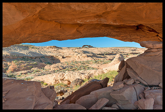 Grand Staircase Escalante National Monument - Sunset Arch viewed through Moonrise  Arch